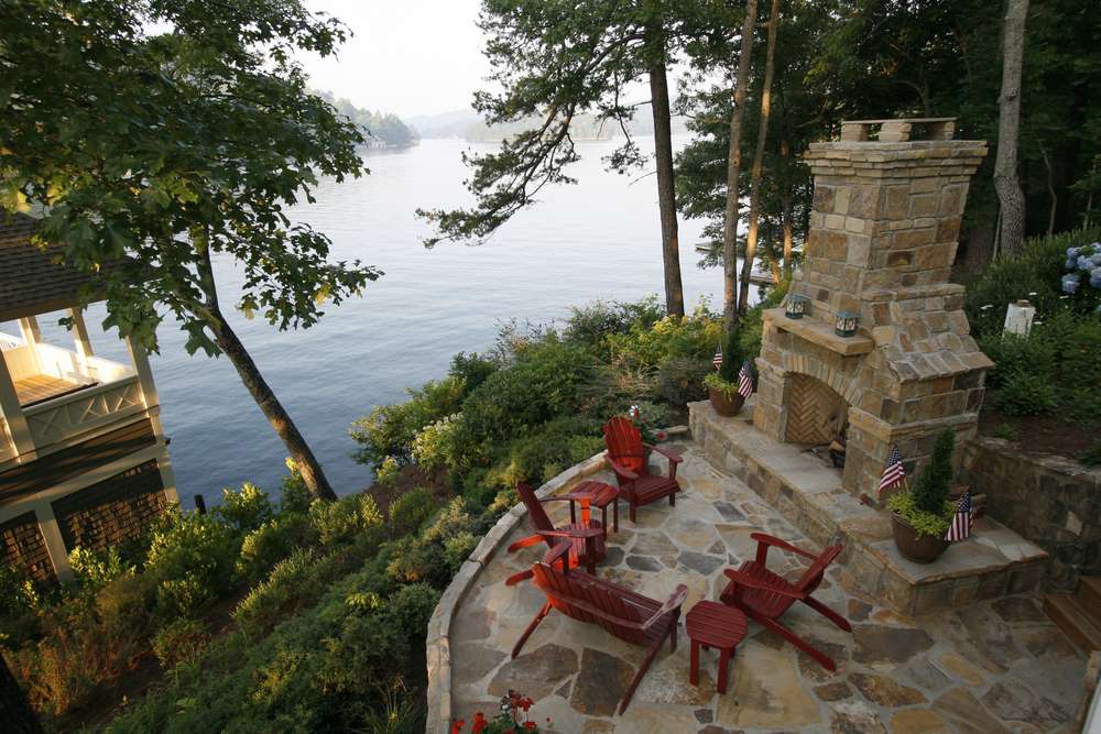 outdoor fireplace overlooking the lake