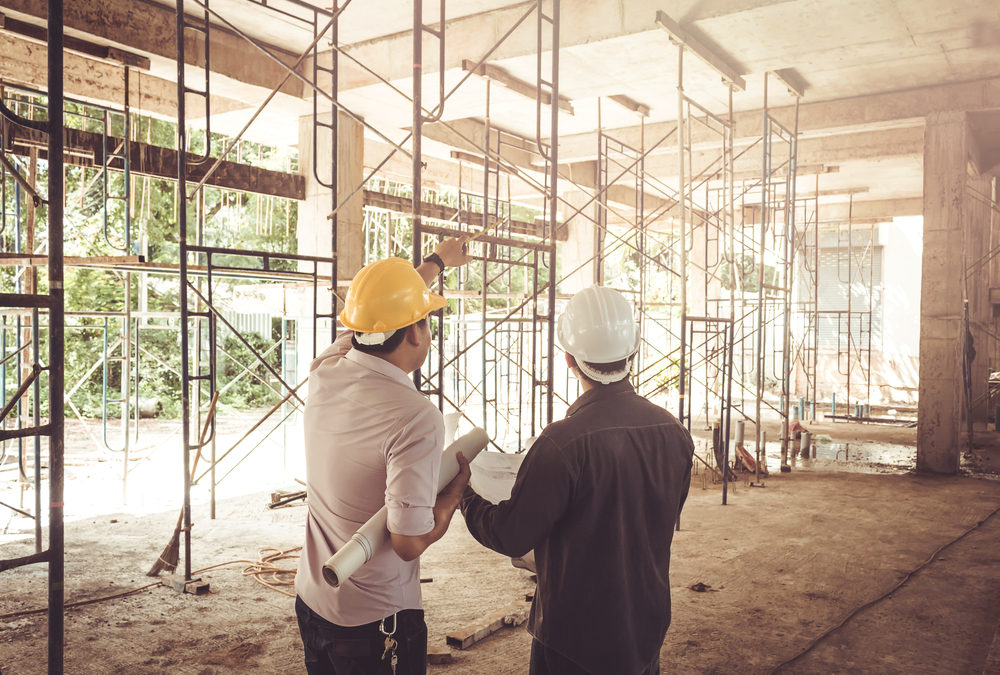 two men on construction site
