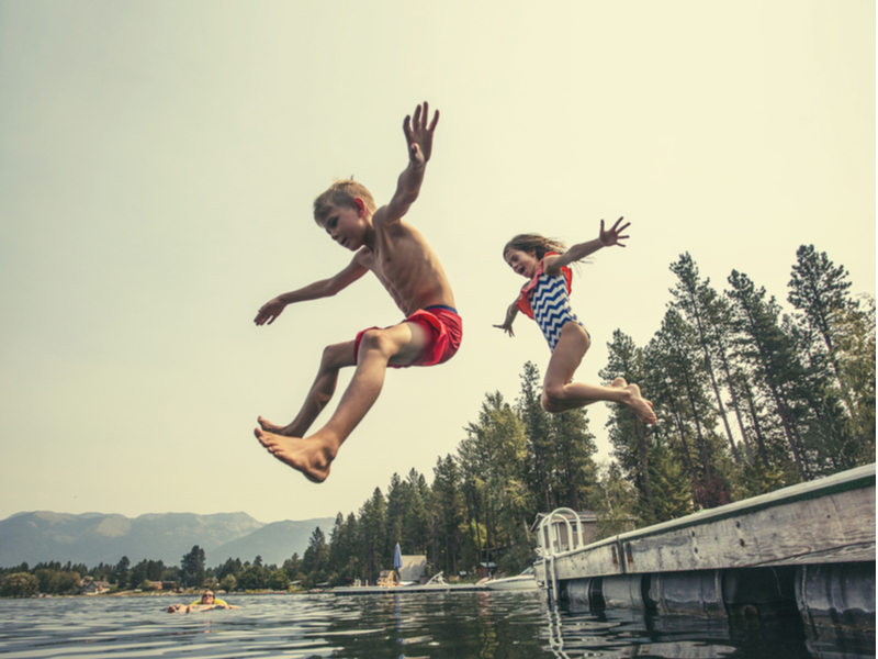 kids jumping off dock