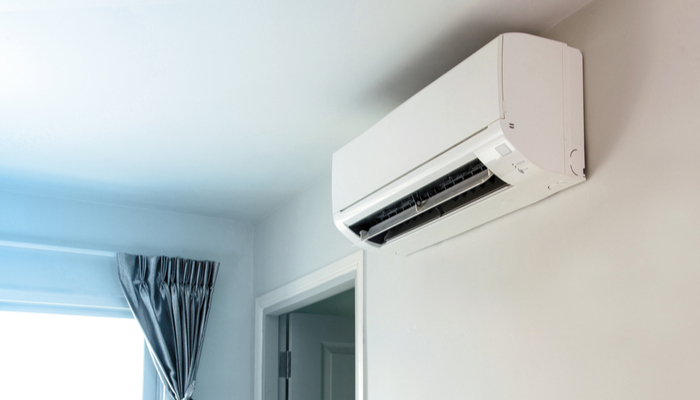 Air conditioner on white wall