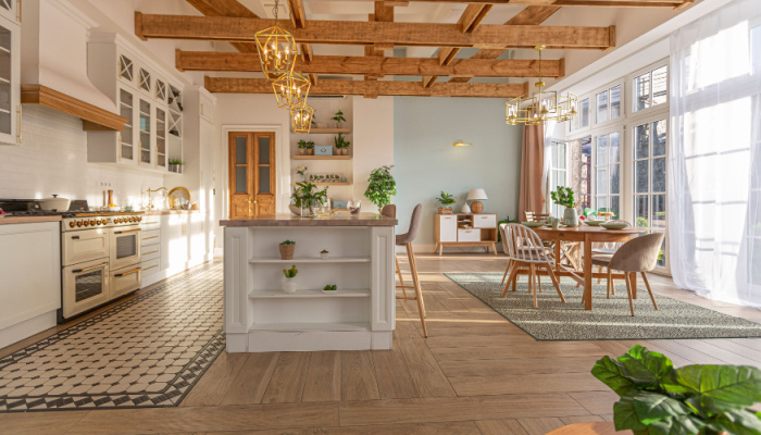 Modern expensive luxurious open-plan kitchen with Scandinavian-style interior with wooden beams on the ceiling