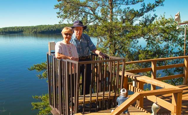 A couple using Tram-Systems in their waterfront property in Lake Anna